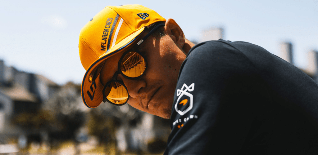 mclaren f1 driver wearing sungod sunglasses