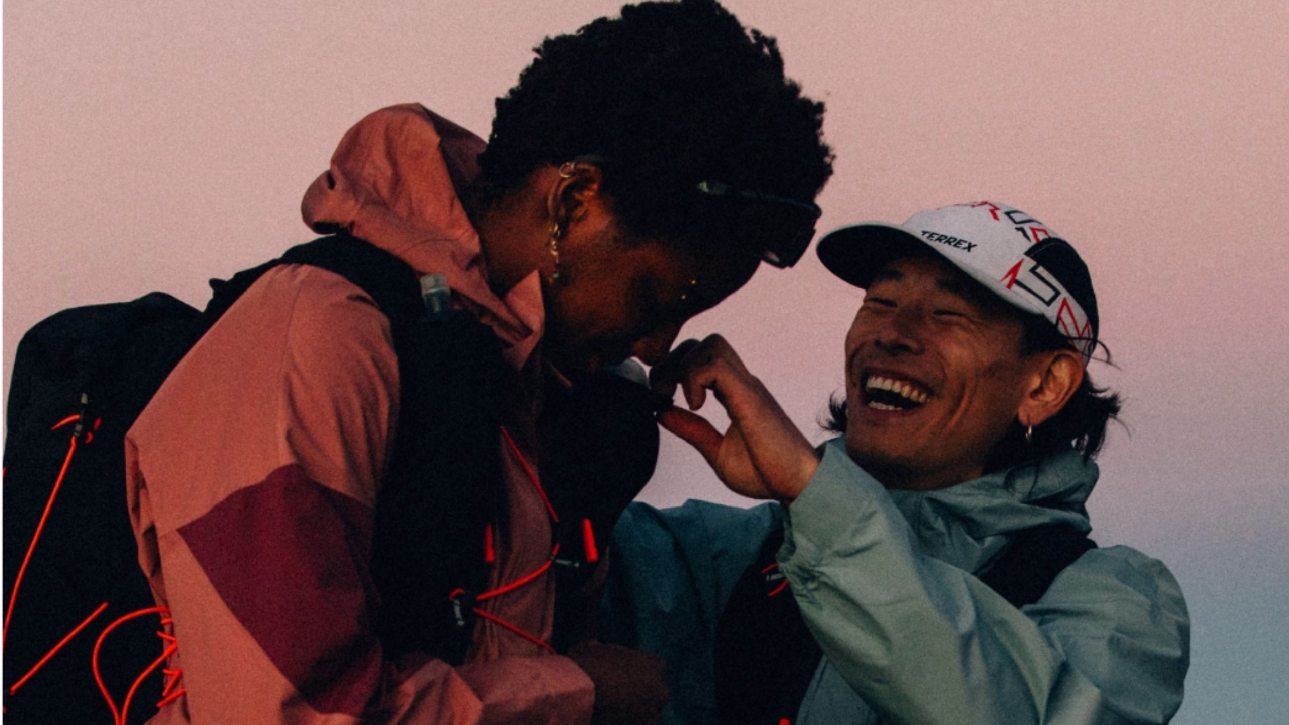 Two people laughing together