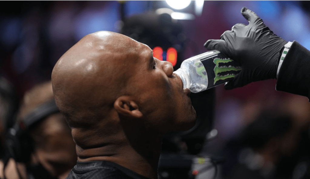 fighter drinking water bottle at ufc london event