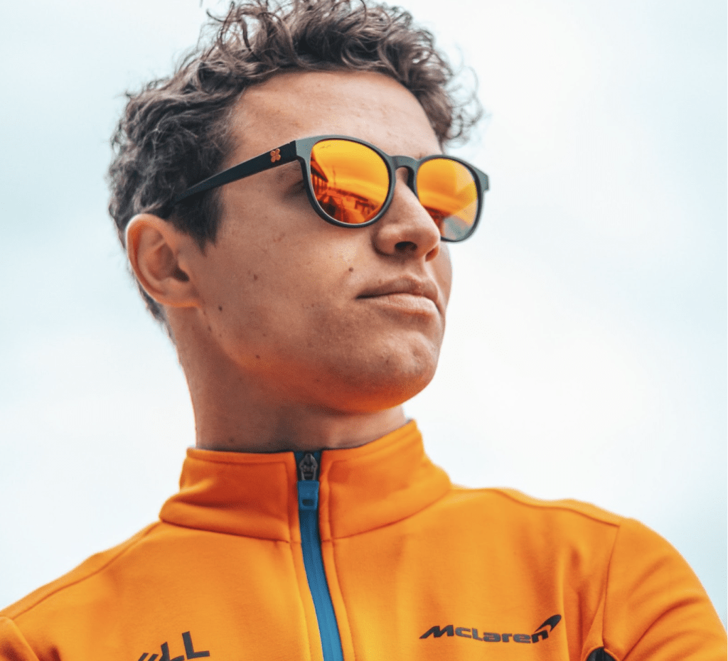 mclaren f1 driver wearing sungod sunglasses