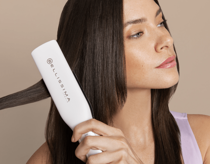 woman using bellissima italia hair curler