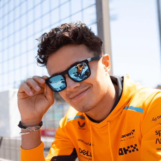 mclaren f1 driver wearing sungod sunglasses
