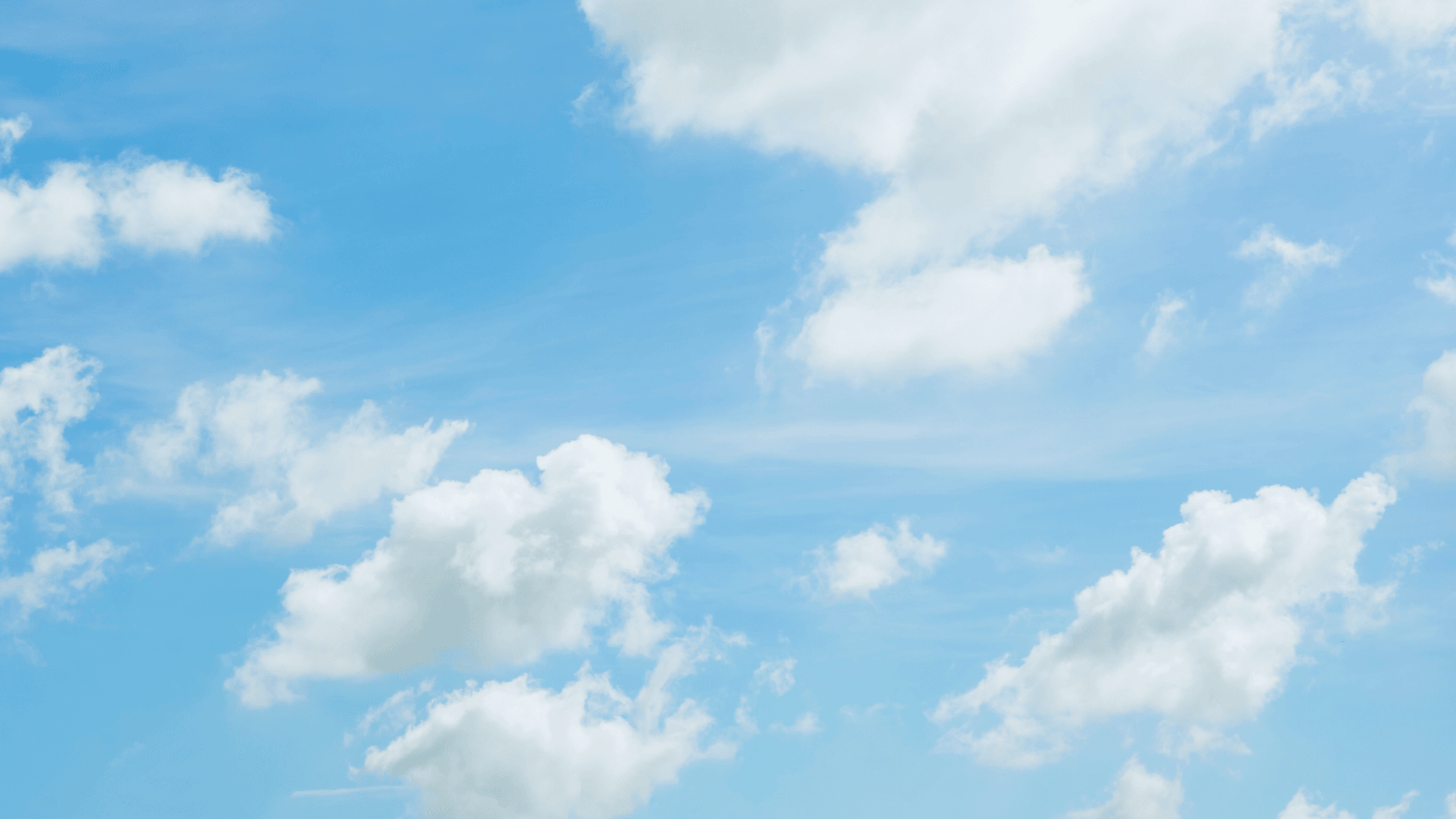 A blue sky with white clouds