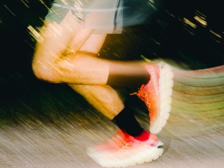 man running in merrell shoes brandnation