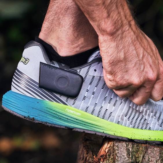 man tying nurvv trainer shoelaces