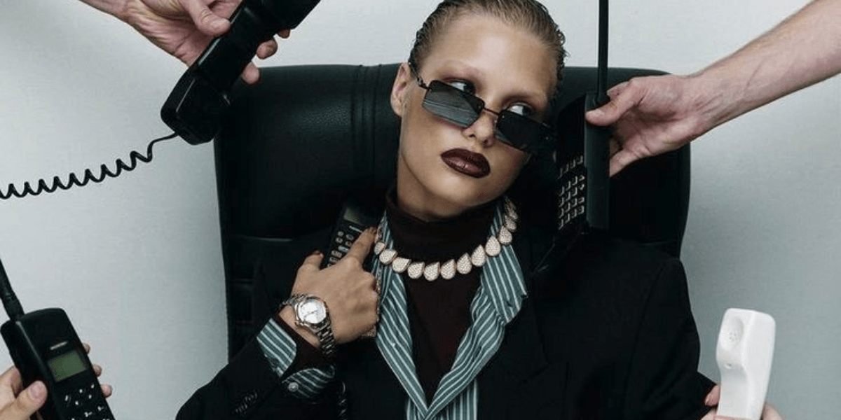 influencer with multiple phones being given to them