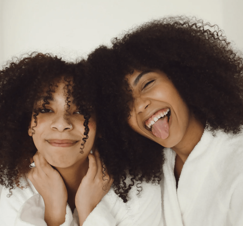 two women smiling on st moriz photoshoot