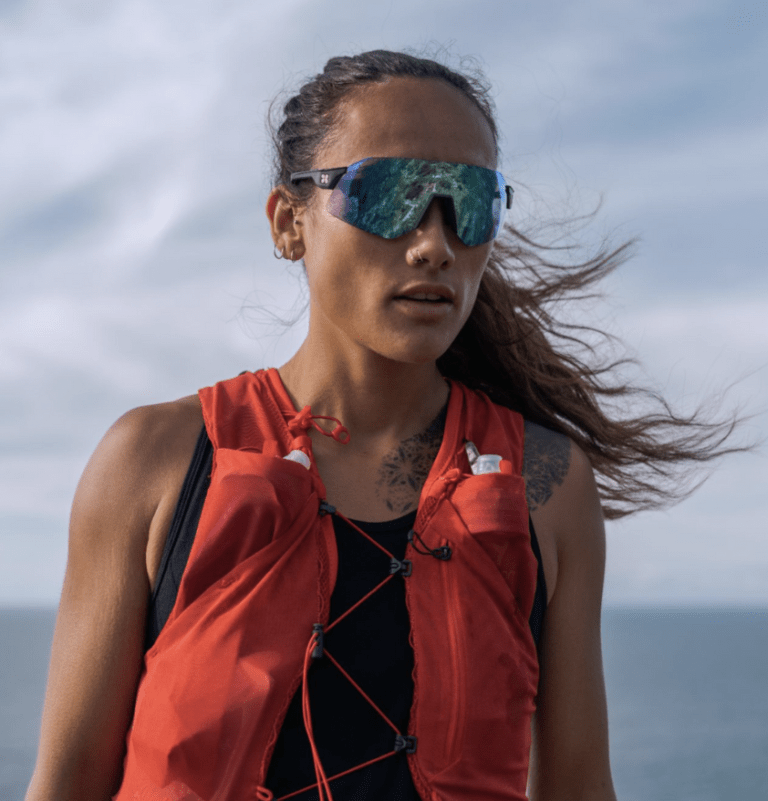 woman wearing sungod sunglasses